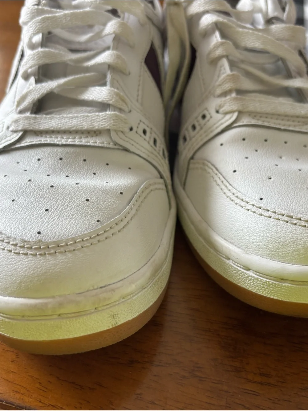 Converse Women’s Low-Top Sneakers in White and purple